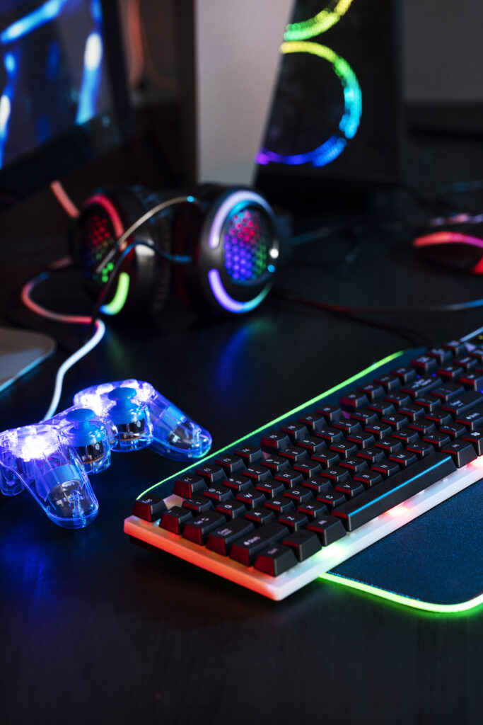 gradient view illuminated neon gaming desk setup with keyboard gradient view illuminated neon gaming desk setup with keyboard